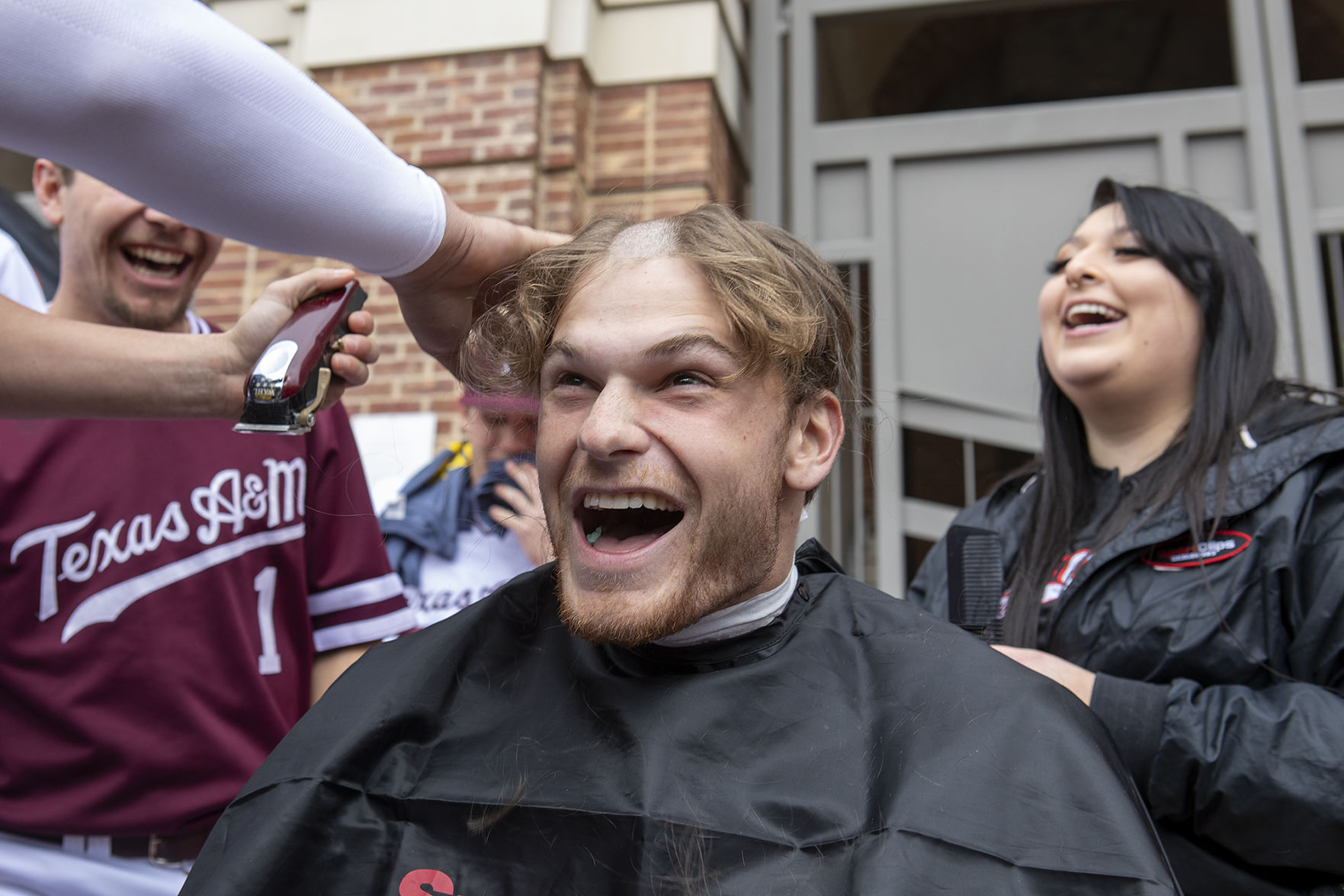 A&M baseball head shaving for cancer